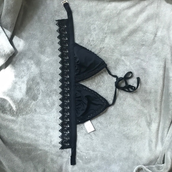 Black bikini swimsuit top, string tie on top and gold clip on the back. - Picture 1 of 7